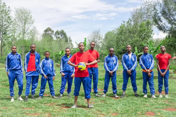 PCEA Enoomatasiani Booth Boys High School - students playing volleyball at the pitch