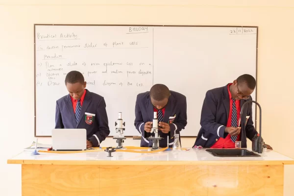 PCEA Enoomatasiani Booth Boys High School - students studying in the laboratory