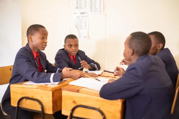 PCEA Enoomatasiani Booth Boys High School - students discussing in class