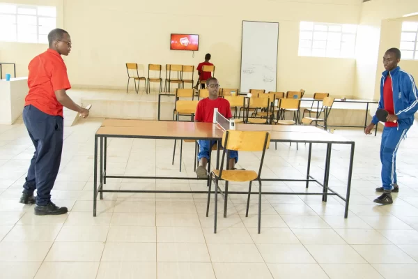 PCEA Enoomatasiani Booth Boys High School - students playing table tennis in the entertainment hall