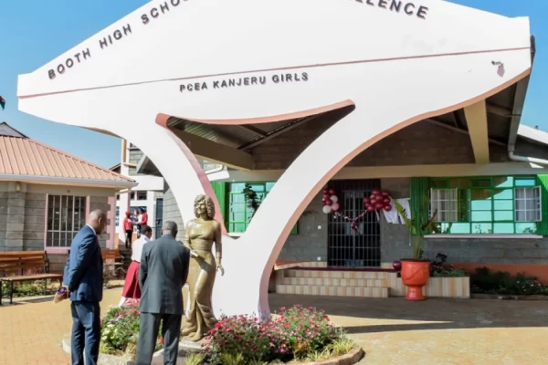 PCEA Kanjeru Booth Girls High School teachers standing outside at the administration block