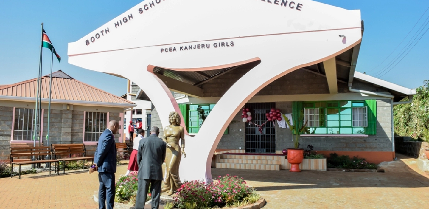 PCEA Kanjeru Booth Girls High School teachers standing outside at the administration block