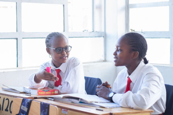 PCEA Ongata Booth Girls High School students discussing in class