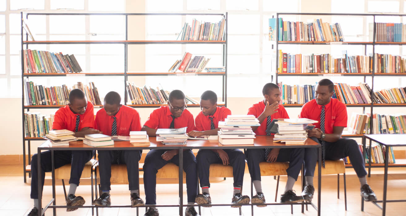 PCEA Enoomatasiani Booth Boys High School students in the library