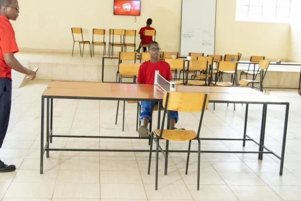 PCEA Enoomatasiani Booth Boys High School - students playing table tennis in the entertainment hall