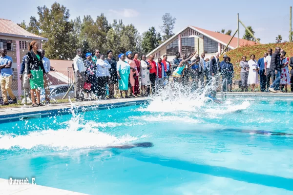 Booth Foundation schools of excellence girls swimming during a swimming competition